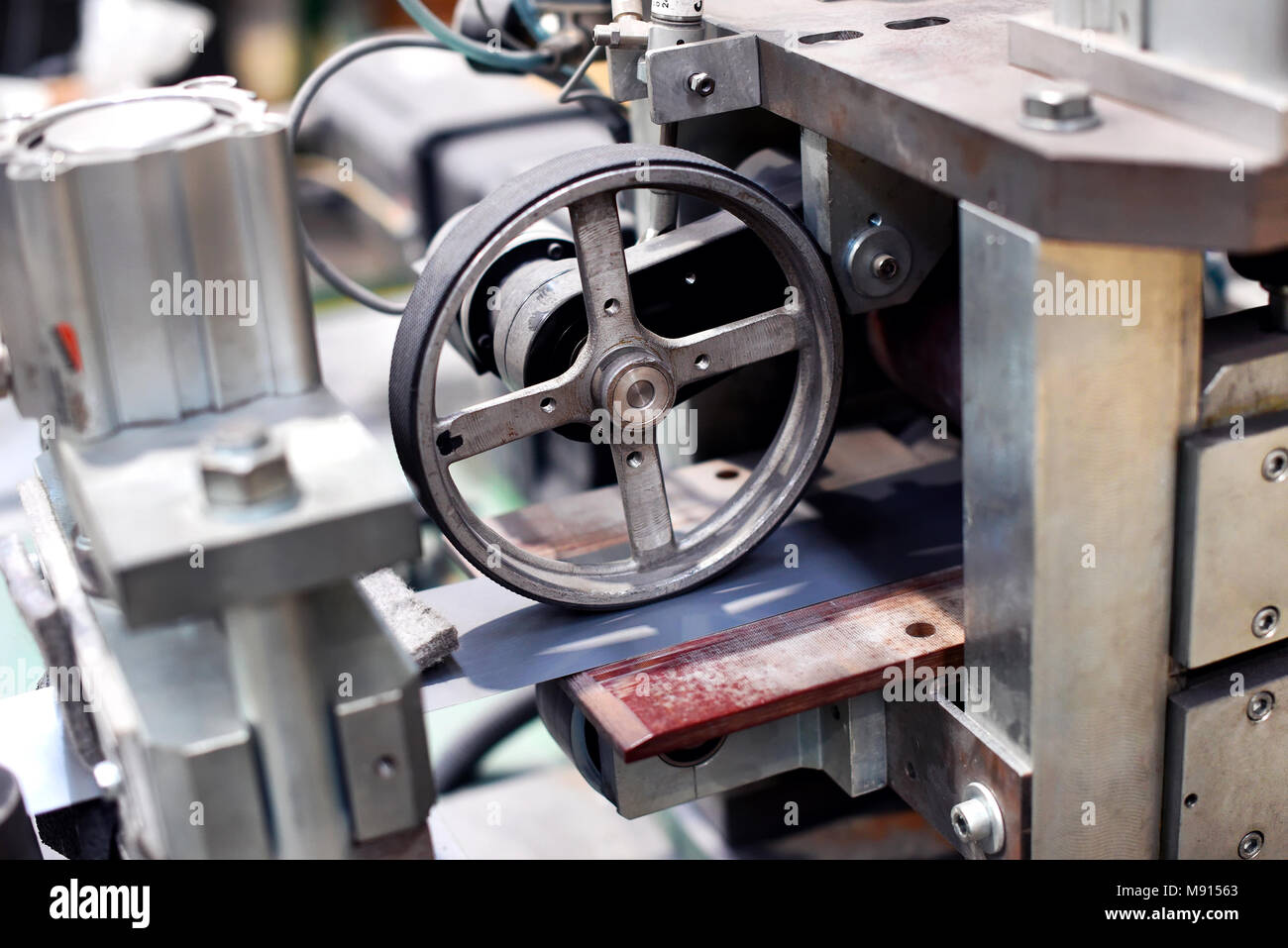 Close up of machinery wheel in factory Stock Photo