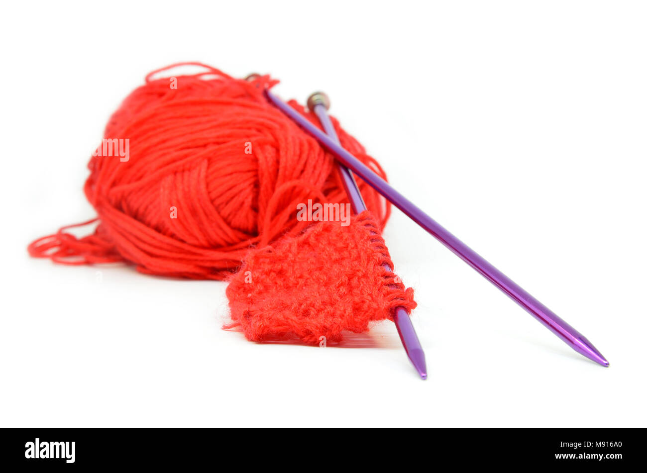 Knitting wool and knitting needles on white background Stock Photo - Alamy