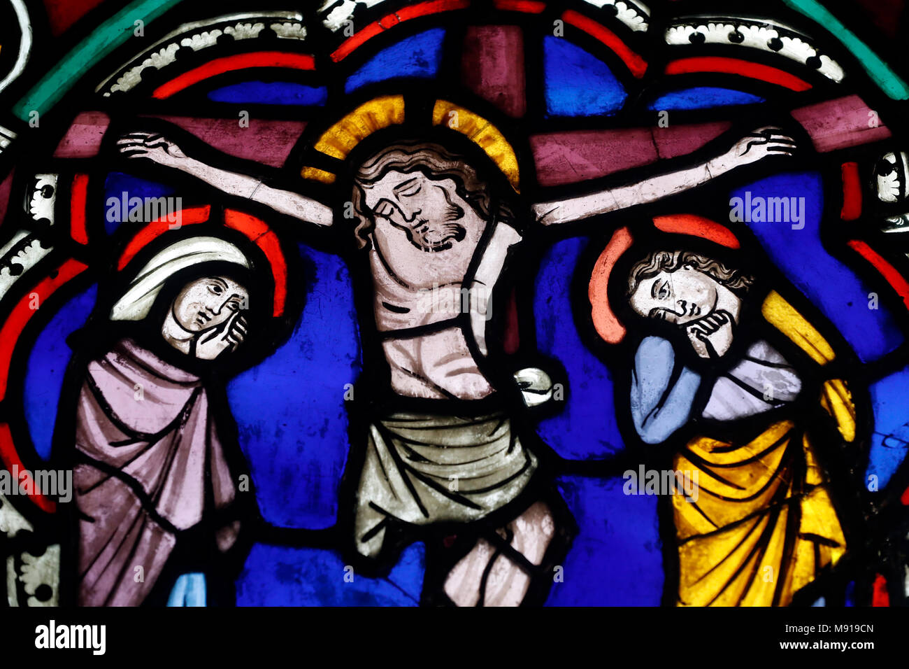 Oeuvre Notre-Dame Museum.  Stained glass window. The crucifixion.  St Thomas church. 13 th century.  Strasbourg. France. Stock Photo
