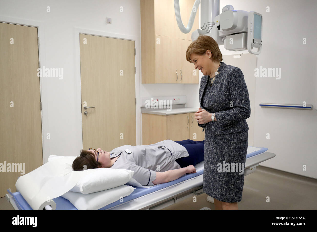 First Minister of Scotland Nicola Sturgeon talks to radiography student Sarah Hallissey in the x-ray suite during a visit to the Out-Patients Department at the new East Lothian Community Hospital in Haddington. Stock Photo