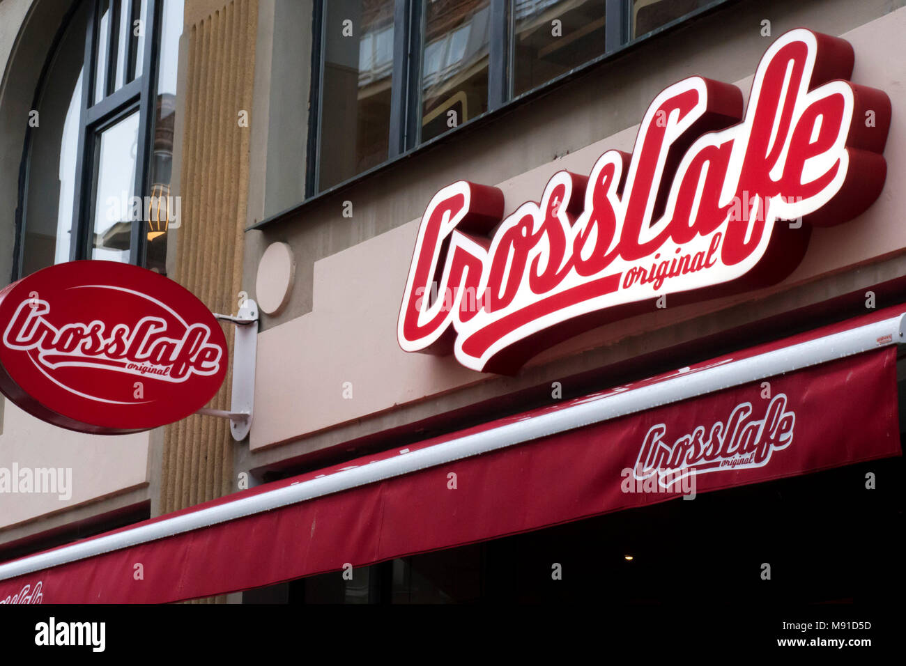 exterior with logo of a Czech coffee shop chain Crosscafe, Pardubice