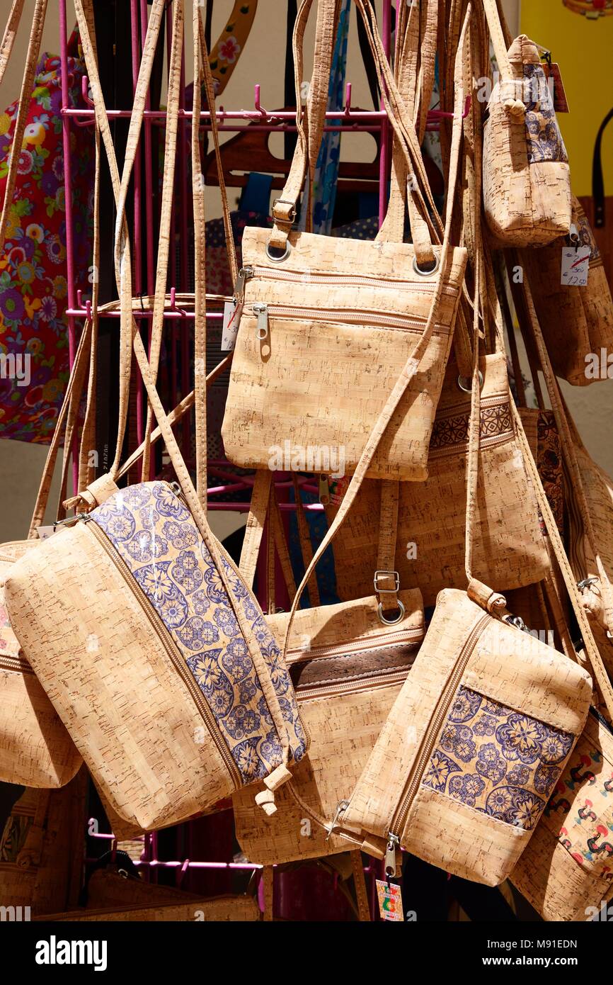 Portuguese cork handbags for sale at an old town shop, Lagos, Algarve, Portugal, Europe. Stock Photo