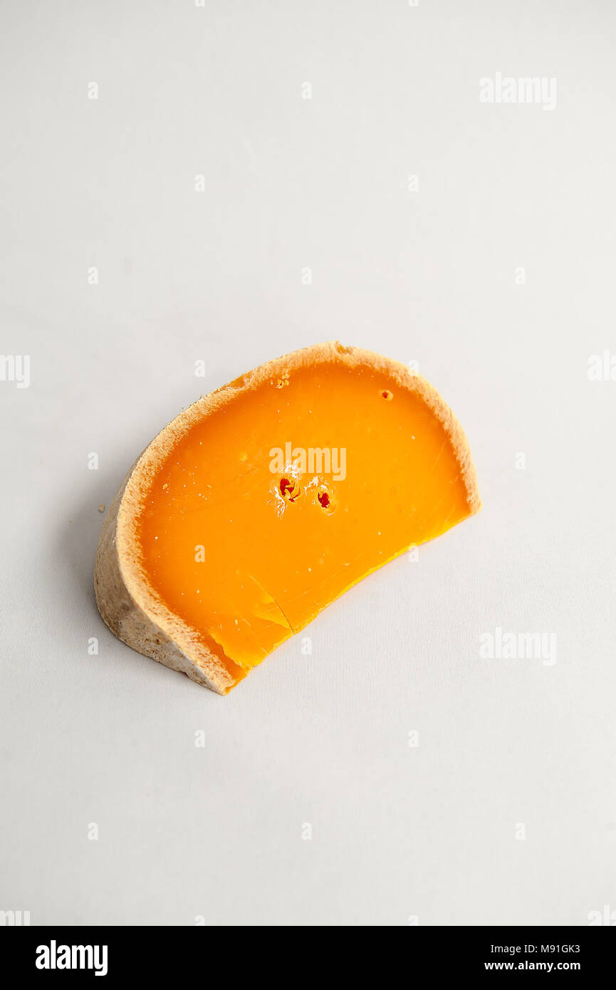 Studio photography of French cheese Mimolette Stock Photo