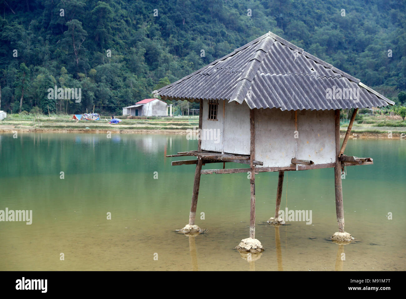 Small house on lake. Bac Son. Vietnam. Stock Photo