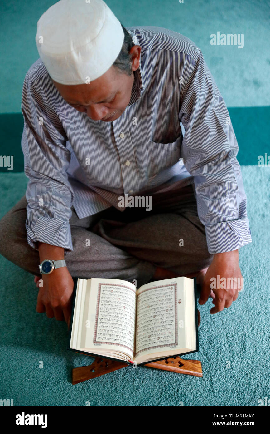 Masjid Al Rahim Mosque. Imam reading the holy Quran. Ho Chi Minh City. Vietnam. Stock Photo