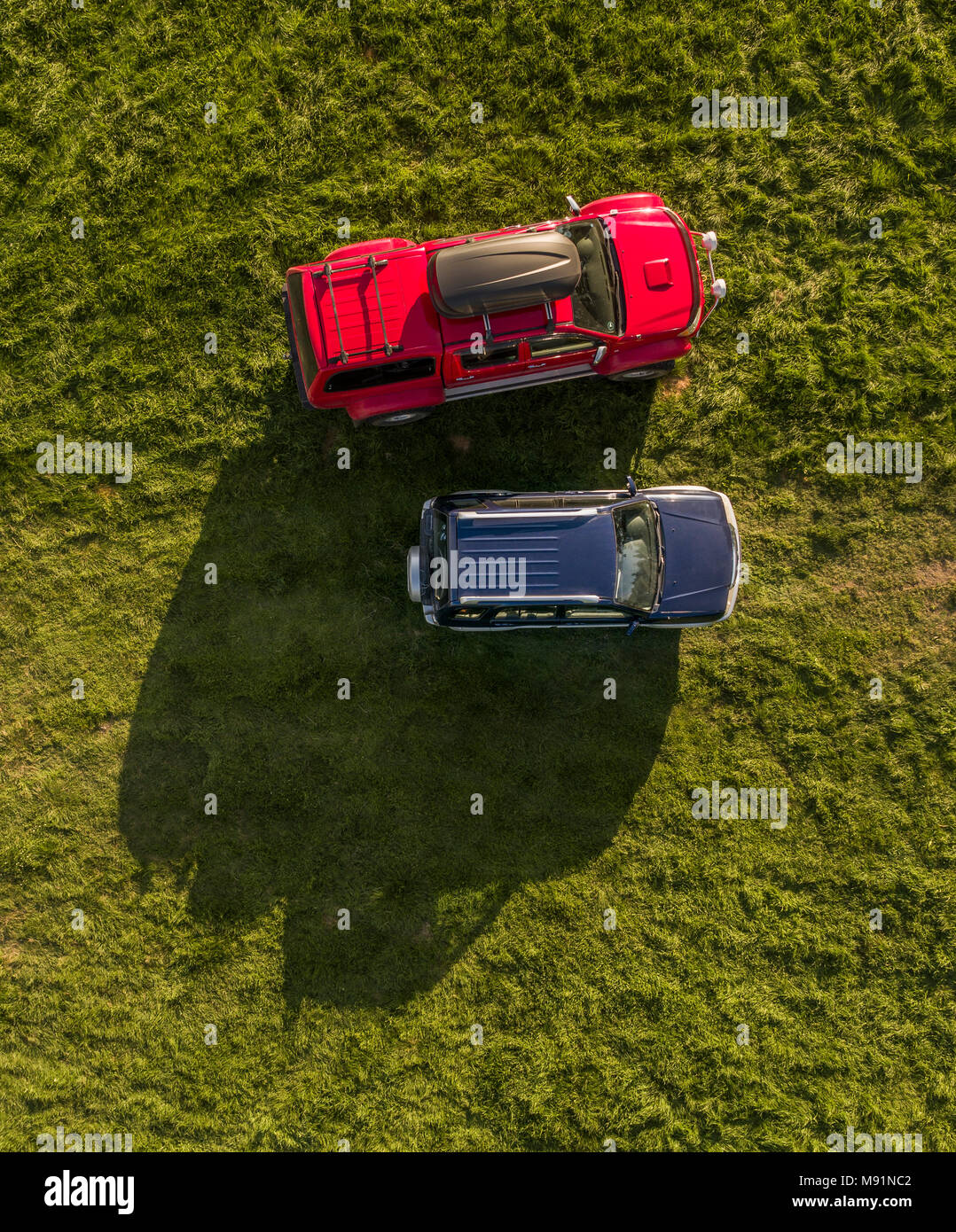 Aerial view of a Hilux truck and SUV. Stock Photo