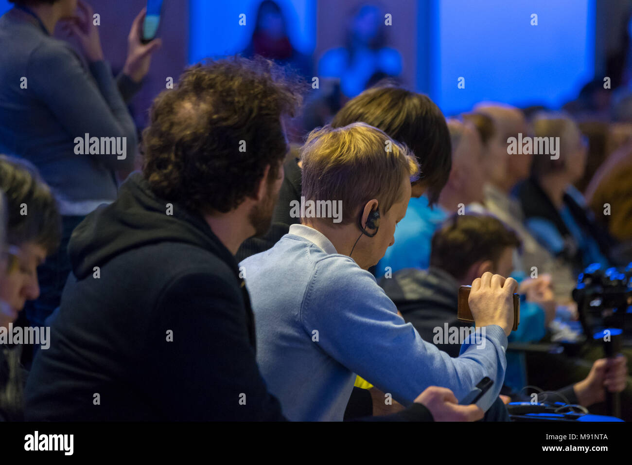 Audience listens to the lecturer Stock Photo - Alamy