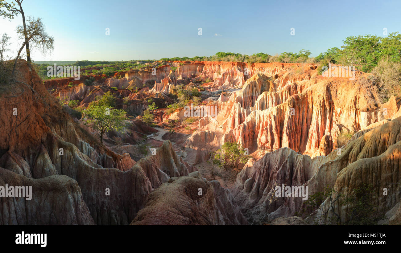 Marafa Depression (Hell's Kitchen canyon) with red cliffs and rocks in afteroon sunset light. Malindi, Kenya Stock Photo