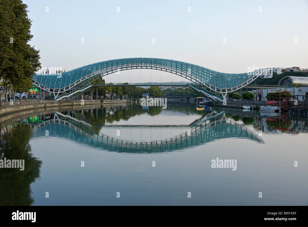 The Peace Bridge across the Mtkvari River, Tbilisi, Georgia Stock Photo