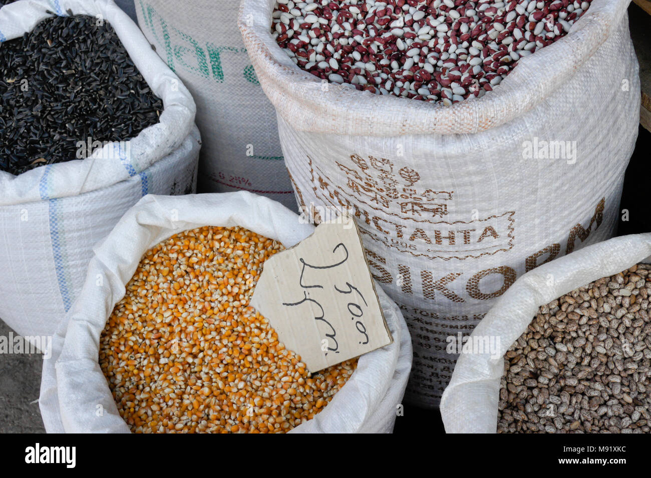 Bags of dried corn and beans for sale at the Dezerters' Bazaar openair market, Tbilisi,