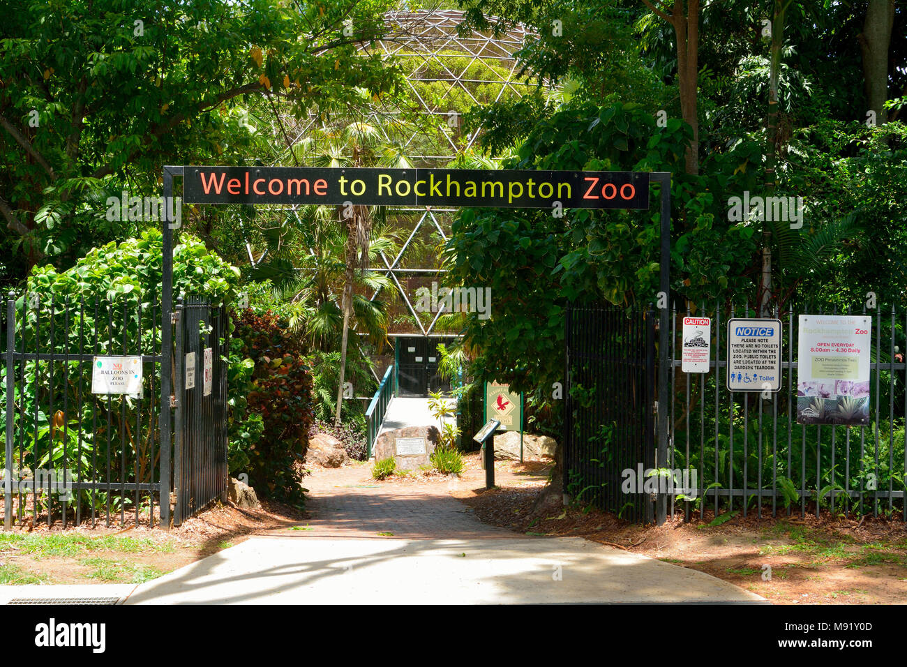 Rockhampton, Queensland, Australia - December 28, 2017. Entrance to Rockhampton zoo, with vegetation and information boards. Stock Photo