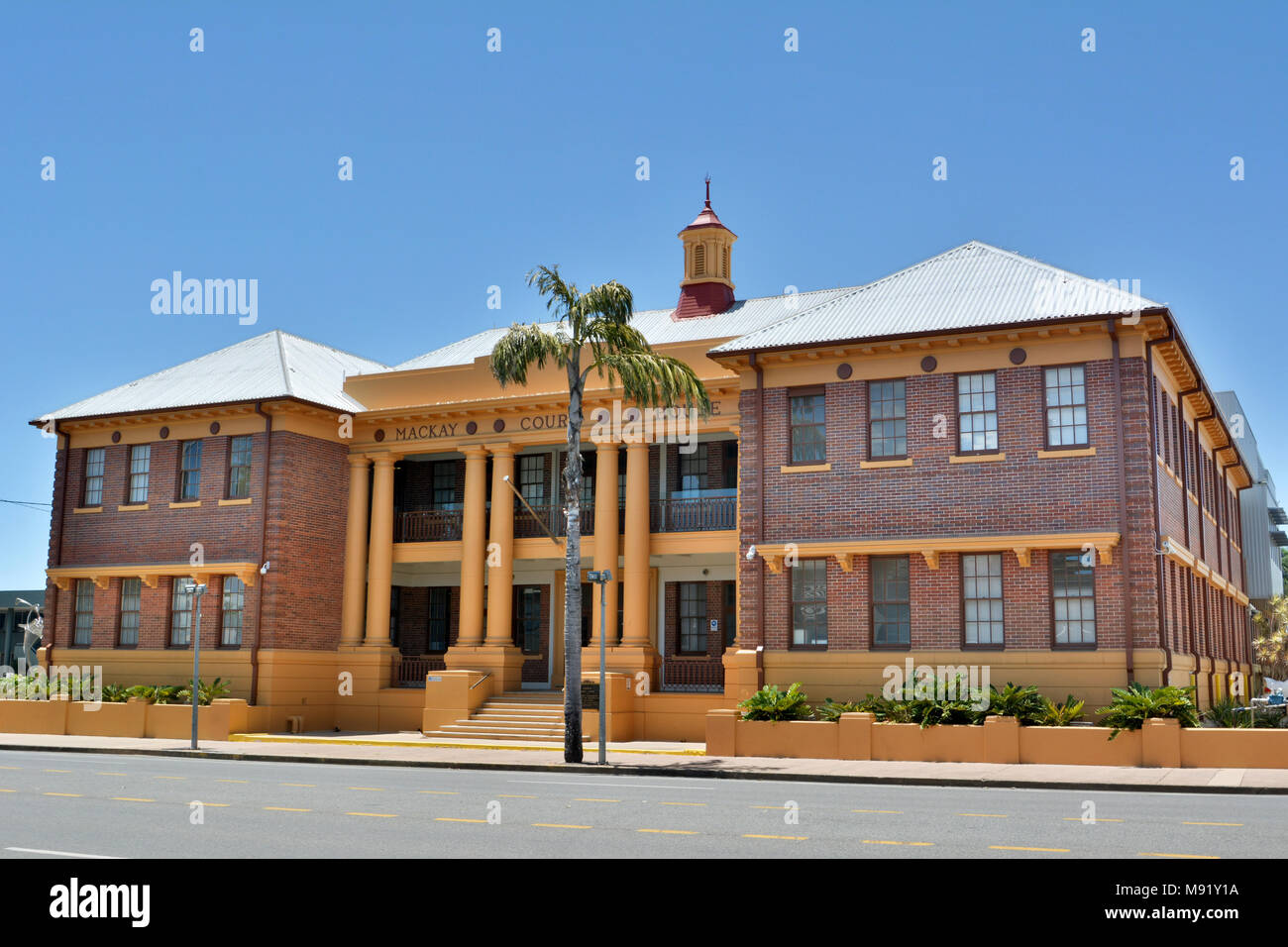 Mackay, Queensland, Australia - December 28, 2017. Historic Mackay Court House in Mackay QLD, with vegetation. Stock Photo