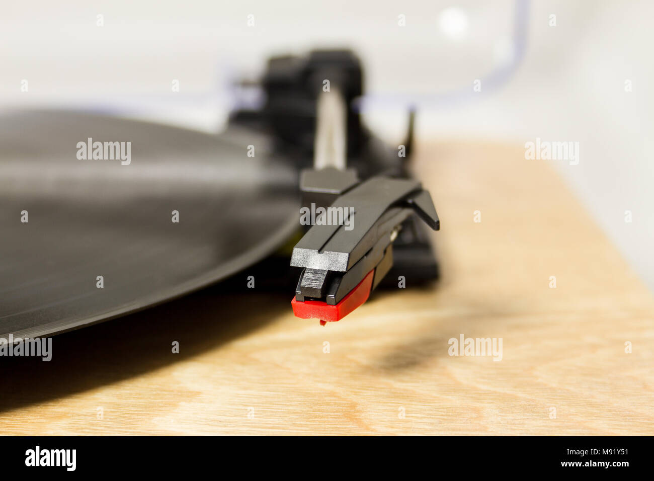 A close up of a record player with stylus Stock Photo