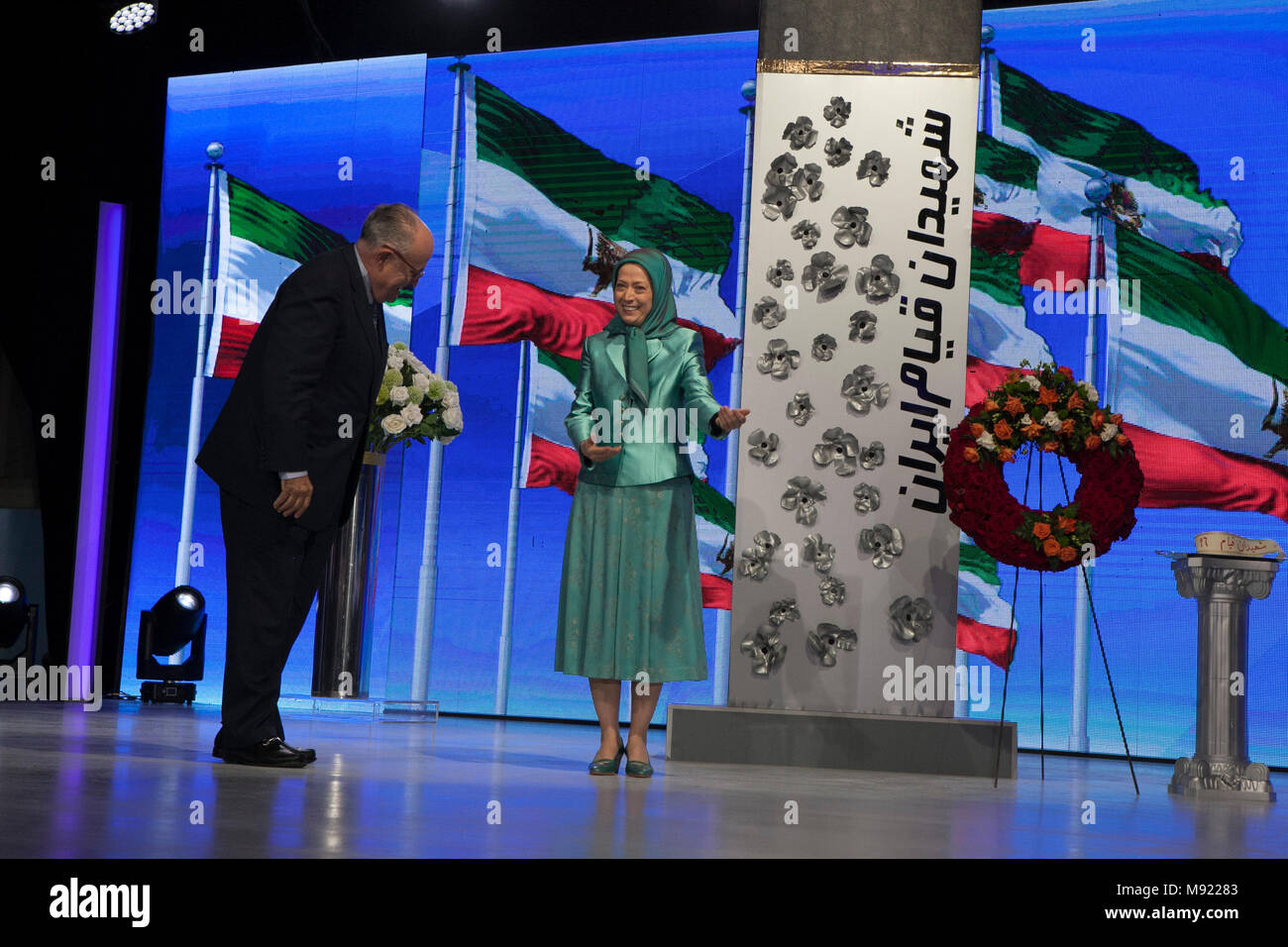 Tirana, Albania. 20th Mar, 2018. Maryam Rajavi, Rudy Giuliani, Iranian New Year - Maryam Rajavi, Mayor Rudy Giuliani, and a number of Albanian political figures attended a ceremony marking the Iranian New Year, Nowruz, on March 20, 2018, at a gathering of members of the People's Mojahedin Organization of Iran (PMOI/MEK) in Albania. Credit: Siavosh Hosseini/Alamy Live News Stock Photo