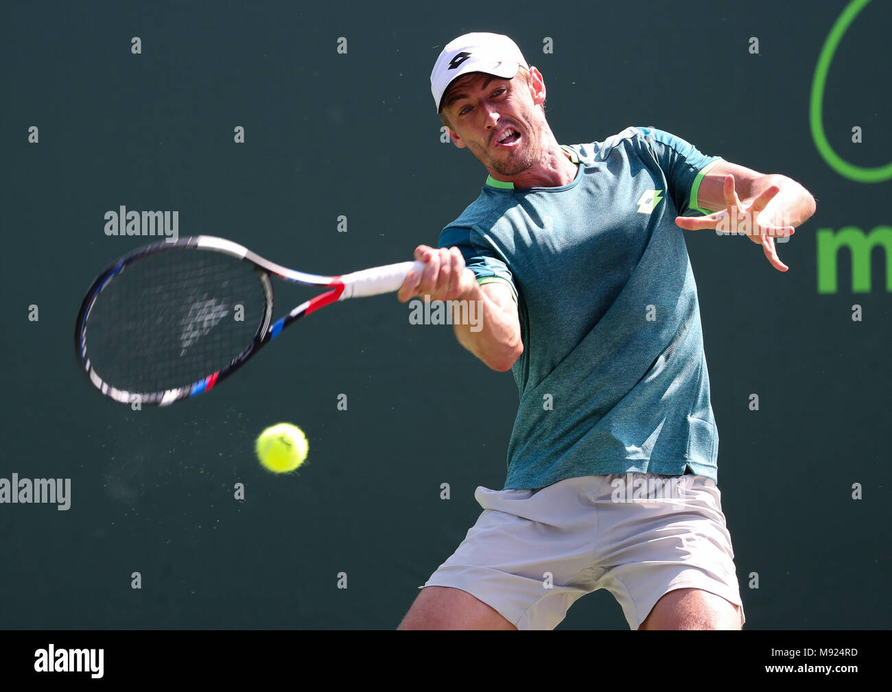 Key Biscayne, Florida, USA. 21st Mar, 2018. John Millman from Australia  plays a forehand against Peter Gojowczyk from Germany during a first round  of the 2018 Miami Open presented by Itau professional