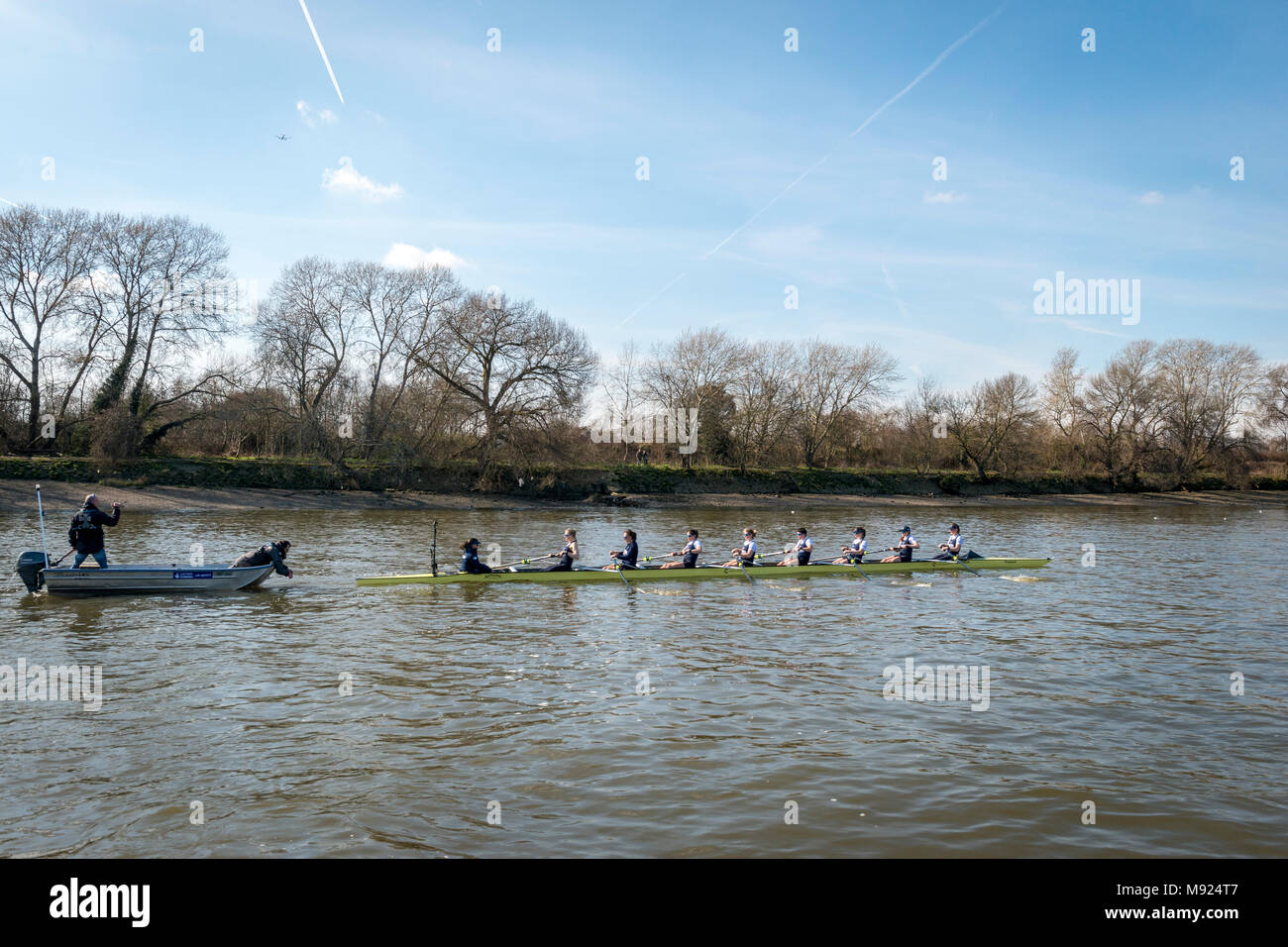 Putney, London, UK. 21 March 2018. Boat Race Practice Outing.  As preparation for the The Cancer Research UK Boat Races on 24 March 2018, Oxford University Women's Boat Club's Blue crew participate in a Practice Outing on the the Boat Race Tideway course.  Coach Andy Nelder follows the boat  Crew list:-  OUWBC Blue crew). Bow:- Renée Koolschijn, 2) Katherine Erickson, 3) Juliette Perry, 4) Alice Roberts, 5) Morgan McGovern, 6) Sara Kushma, 7) Abigail Killen, Stroke:- Beth Bridgman, Cox: Jessica Buck. Credit: Duncan Grove/Alamy Live News Stock Photo