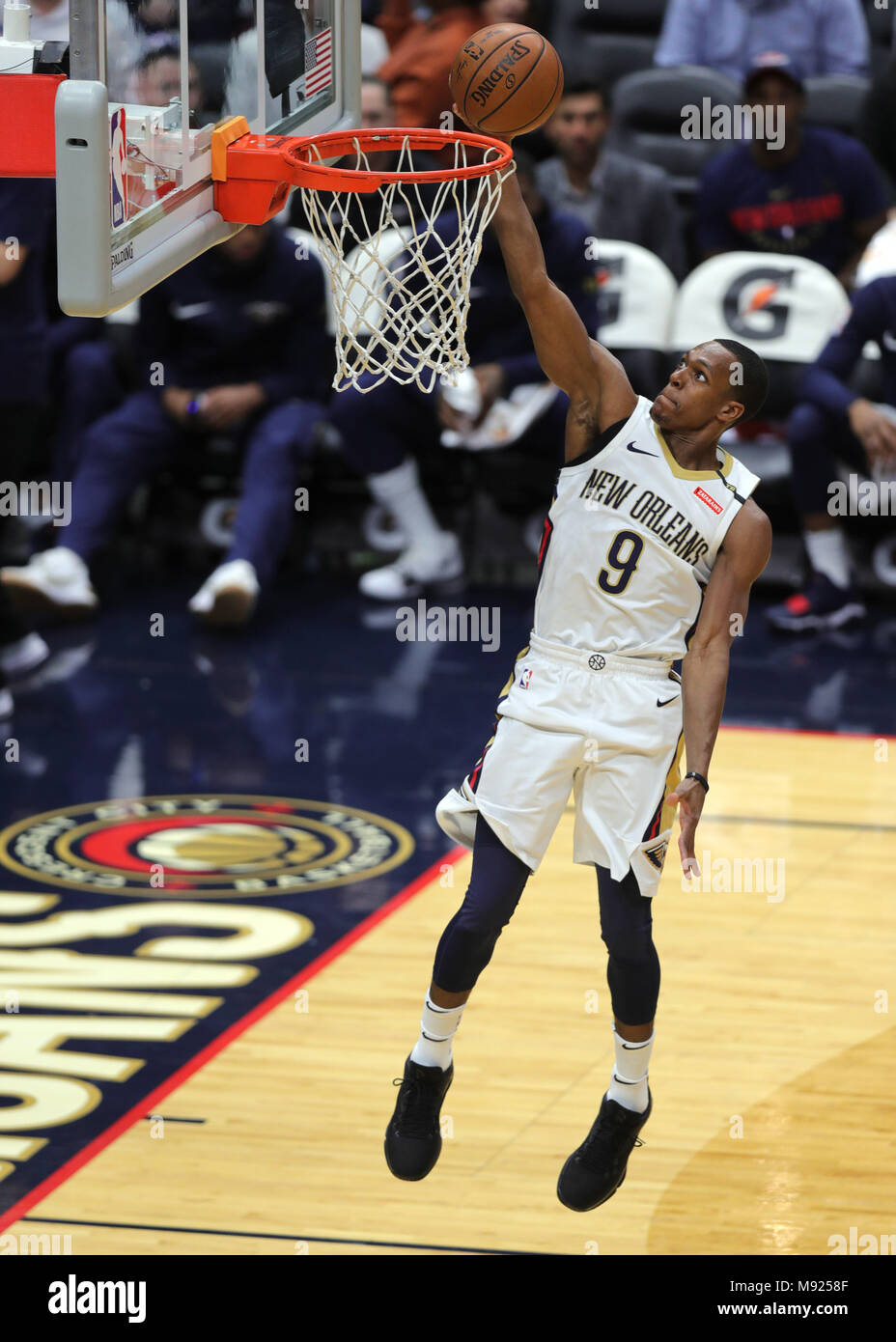 New Orleans, LA, USA. 20th Mar, 2018. New Orleans Pelicans guard Rajon Rondo (9) dunks the ball against Dallas Mavericks at the Smoothie King Center in New Orleans, LA. Stephen Lew/CSM/Alamy Live News Stock Photo