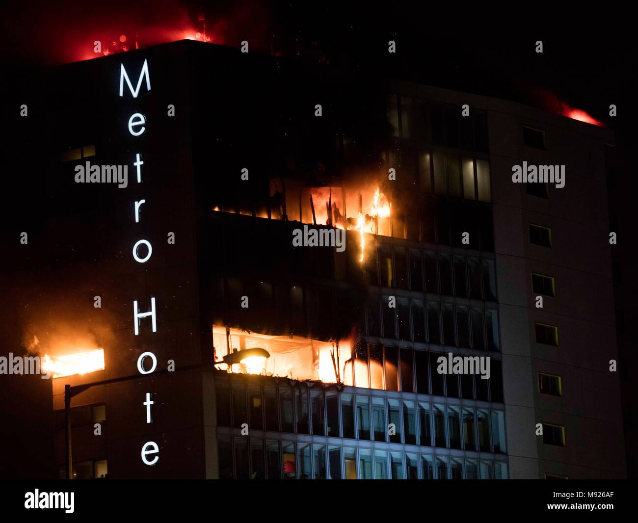 Dublin, Ireland. 21st March, 2018. 21/3/2018. Metro Hotel Fire Ballymun, Dublin Ireland. Fire takes hold of the Metro Hotel in Ballymun in Dublin. There were no casualties as 150 people were evacuated from the hotel and apartment building on the nortside of Dublin City. It is believed the fire started in an apartment on the 13th floor of the building which until recently was used to house a number of homeless famlies. Photo: Eamonn Farrell/ Credit: /Alamy Live News Stock Photo