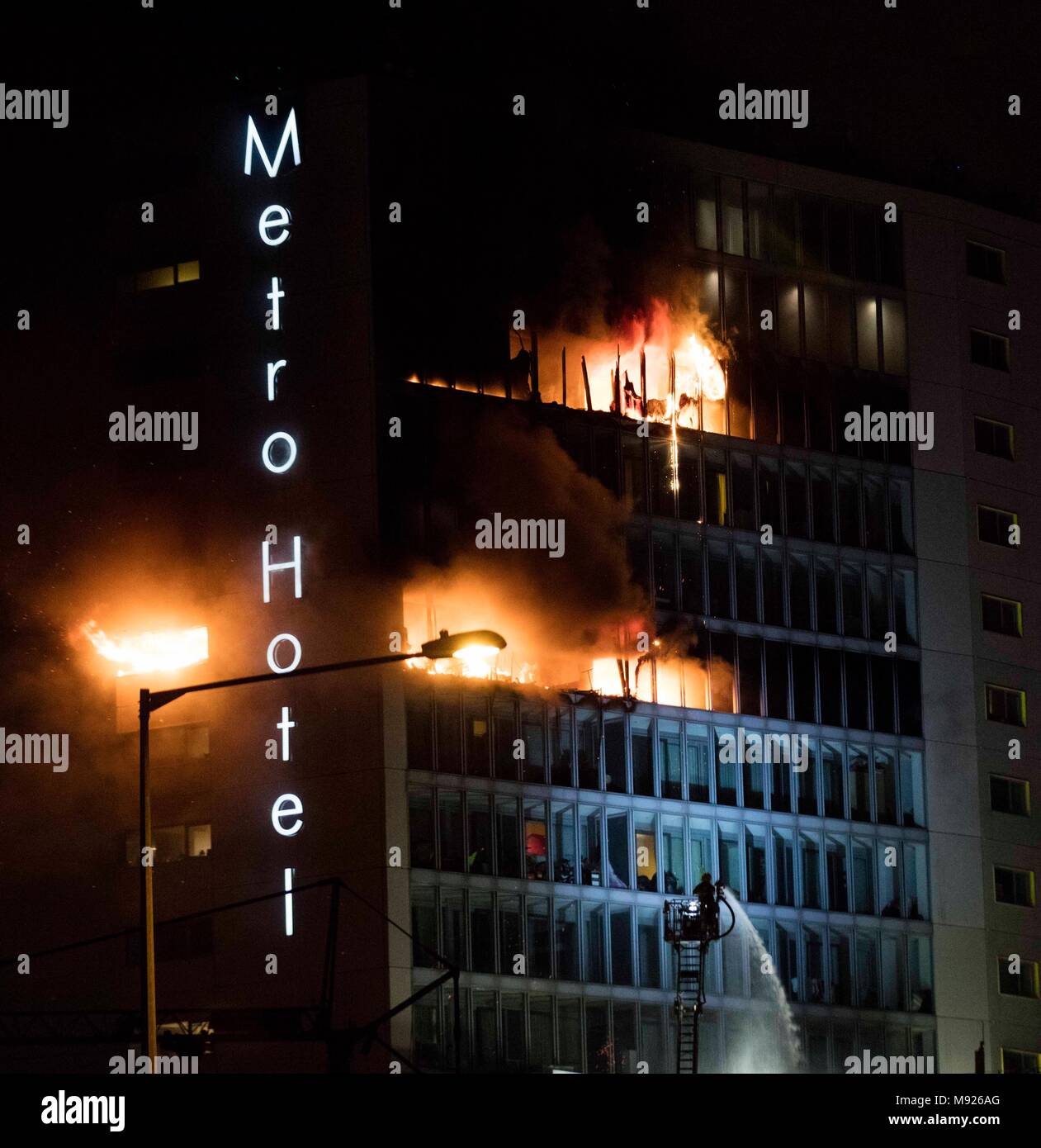 Dublin, Ireland. 21st March, 2018. 21/3/2018. Metro Hotel Fire Ballymun, Dublin Ireland. Fire takes hold of the Metro Hotel in Ballymun in Dublin. There were no casualties as 150 people were evacuated from the hotel and apartment building on the nortside of Dublin City. It is believed the fire started in an apartment on the 13th floor of the building which until recently was used to house a number of homeless famlies. Photo: Eamonn Farrell/ Credit: /Alamy Live News Stock Photo