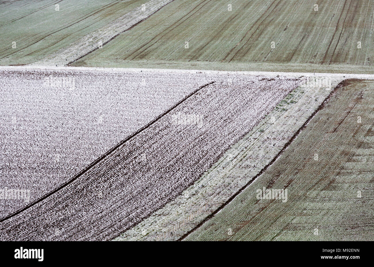 Snow and field patterns on the Chartham Downs, North Kent Downs, Canterbury, Kent, UK. Stock Photo