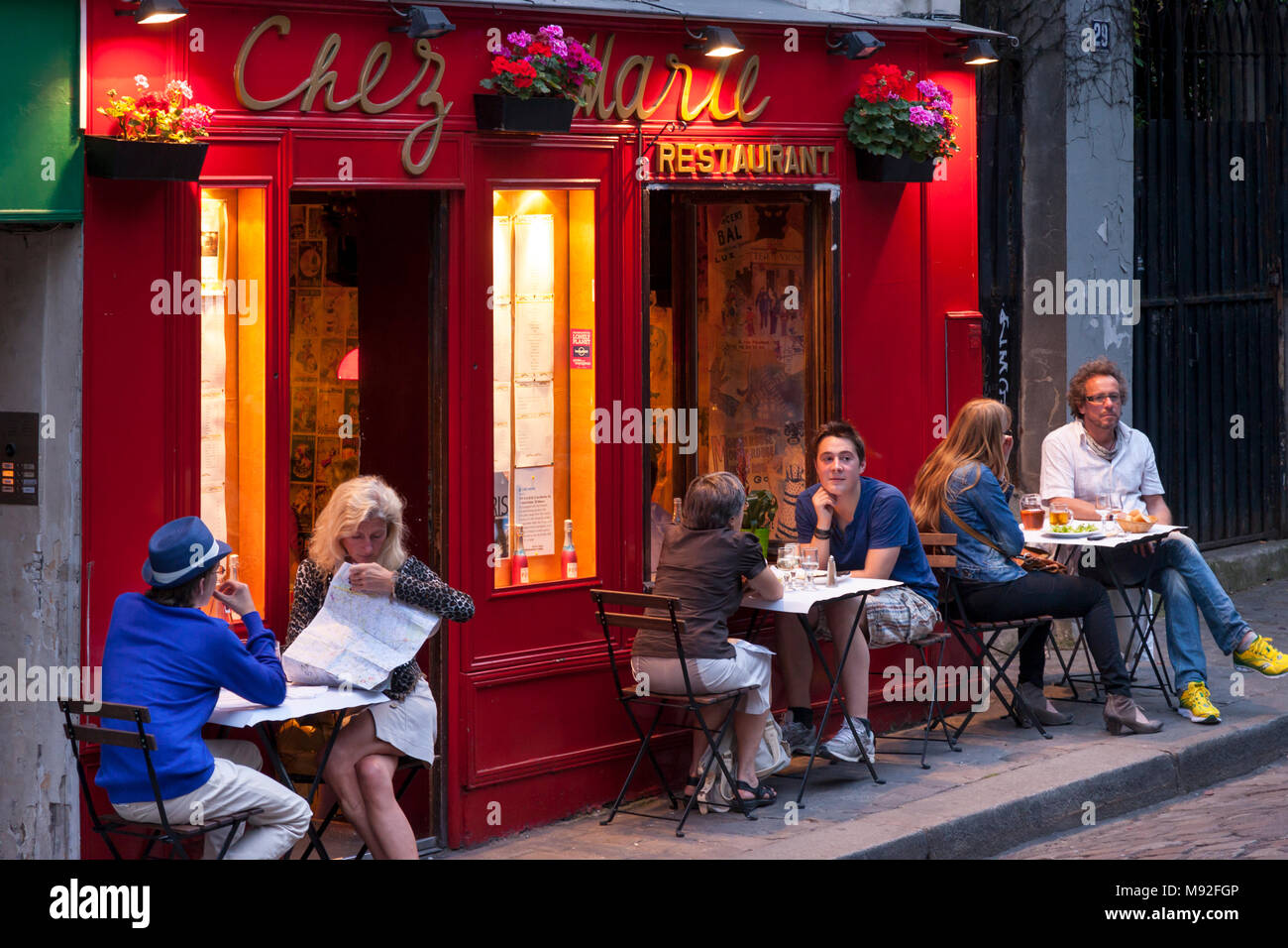Sidewalk dining at Chez Marie Restaurant along Rue Gabrielle, Montmartre, Paris, France Stock Photo