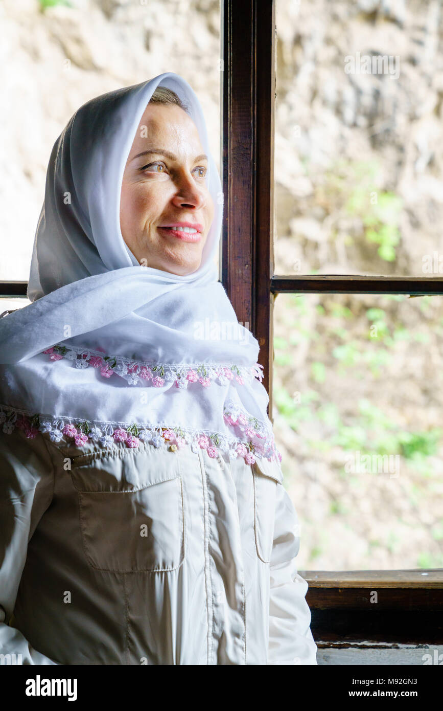 Portrait of a woman wearing traditional headscarf at a Dervish monastery in Bosnia Stock Photo