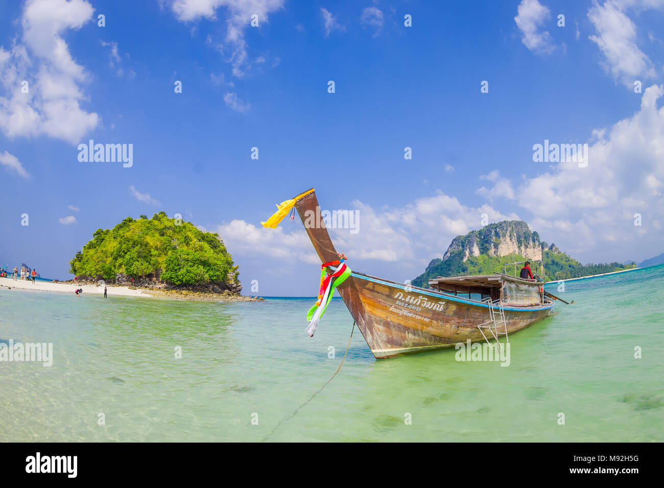TUP, THAILAND - FEBRUARY 09, 2018: Amazing view of long tail boat in a shore on Tup island in a gorgeous sunny day and clean water Stock Photo