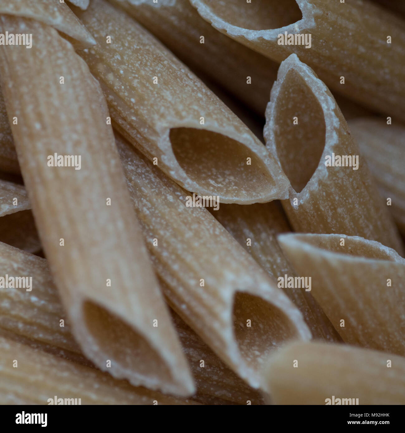 Bulk whole wheat pasta Stock Photo Alamy