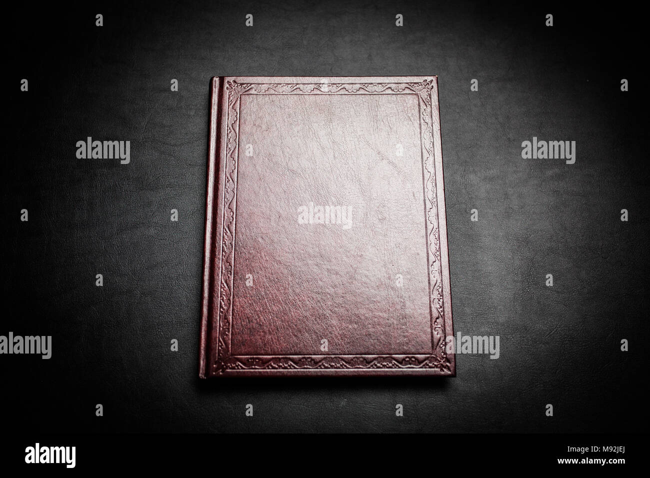 Old leather covered book Stock Photo - Alamy
