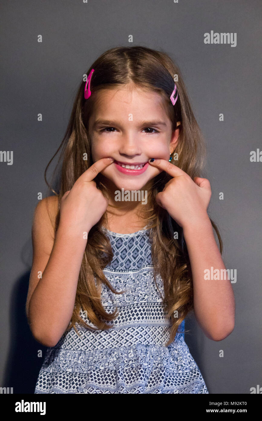 little cute girl showing to smile Stock Photo Alamy