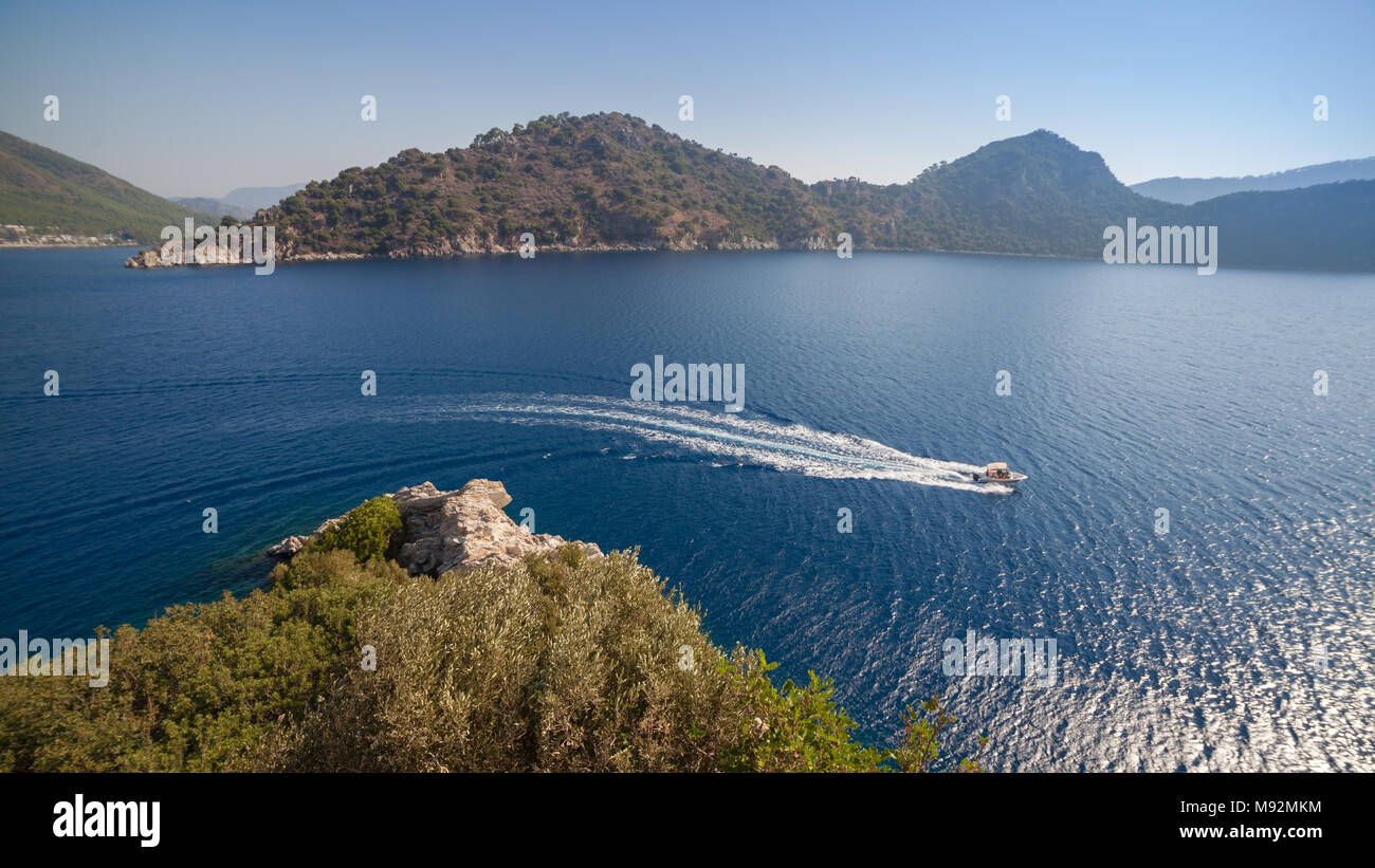 A view from above of a boat in the strait of the Mediterranean Sea near Marmaris, Turkey Stock Photo