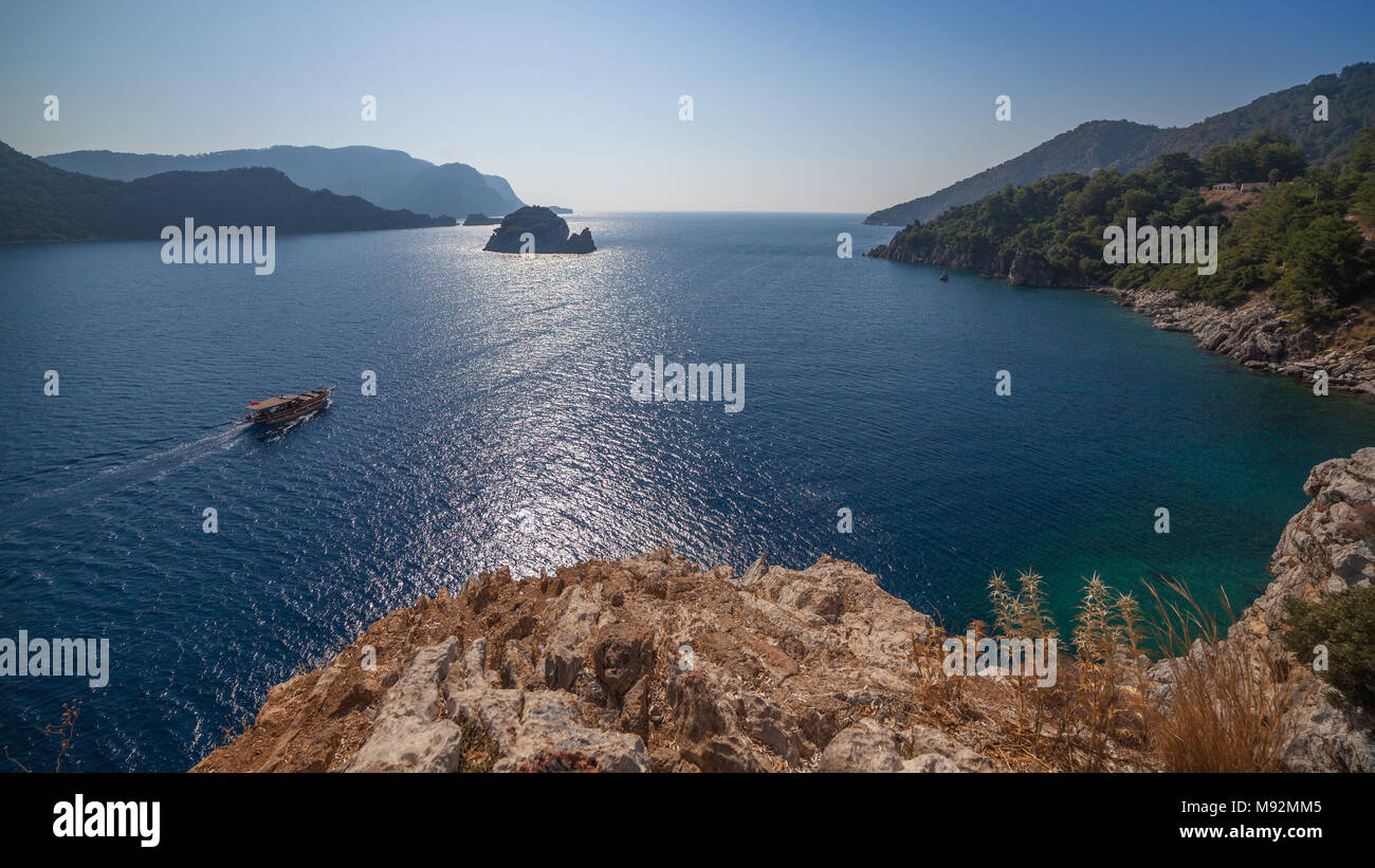 A view from above of a boat in the strait of the Mediterranean Sea near Marmaris, Turkey Stock Photo