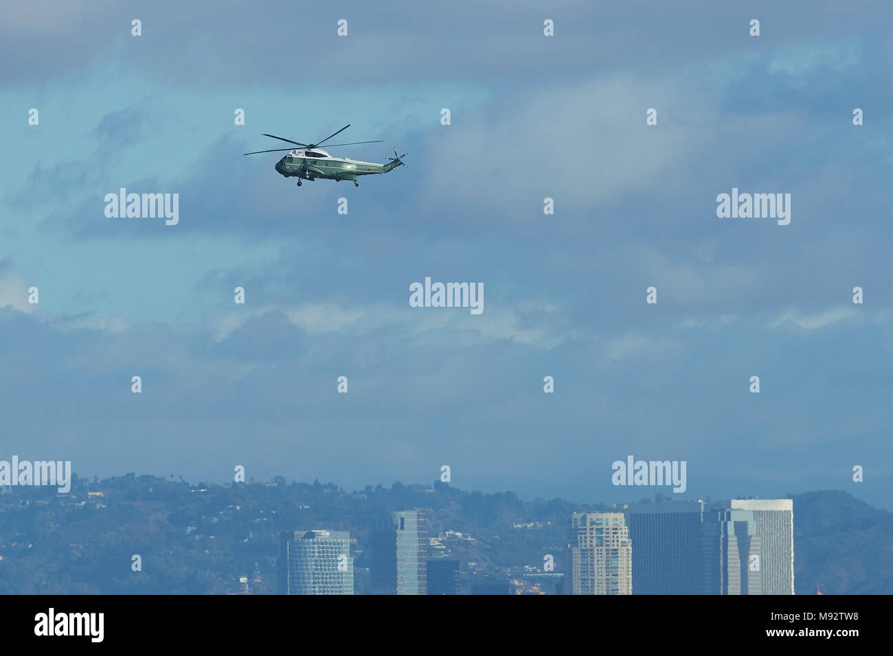 Presidential Helicopter, Marine One, Carrying President Donald Trump To Los Angeles International Airport, LAX, California, USA. 14 March 2014. Stock Photo