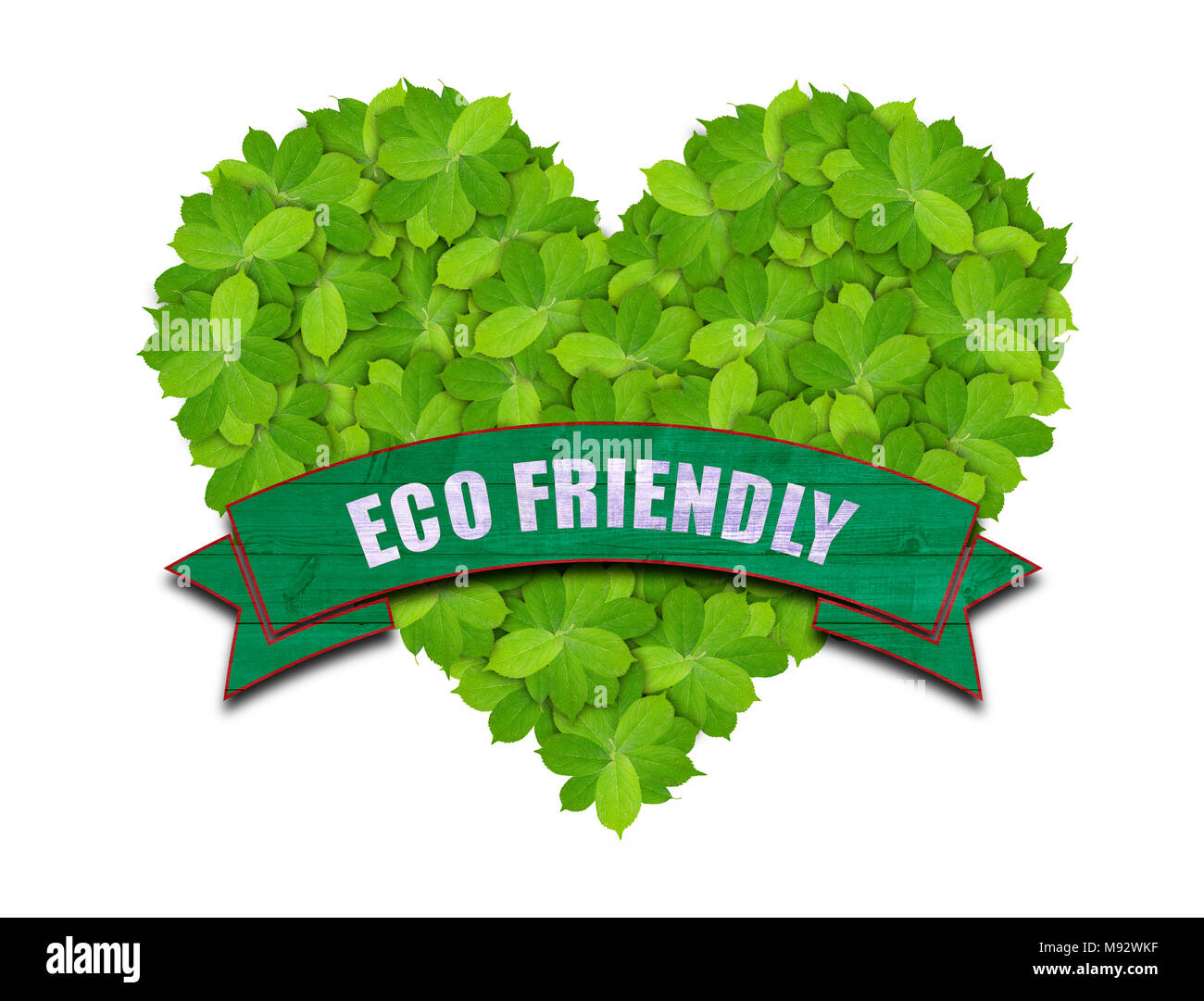 Green heart made of green leaves with green eco friendly banner Stock Photo