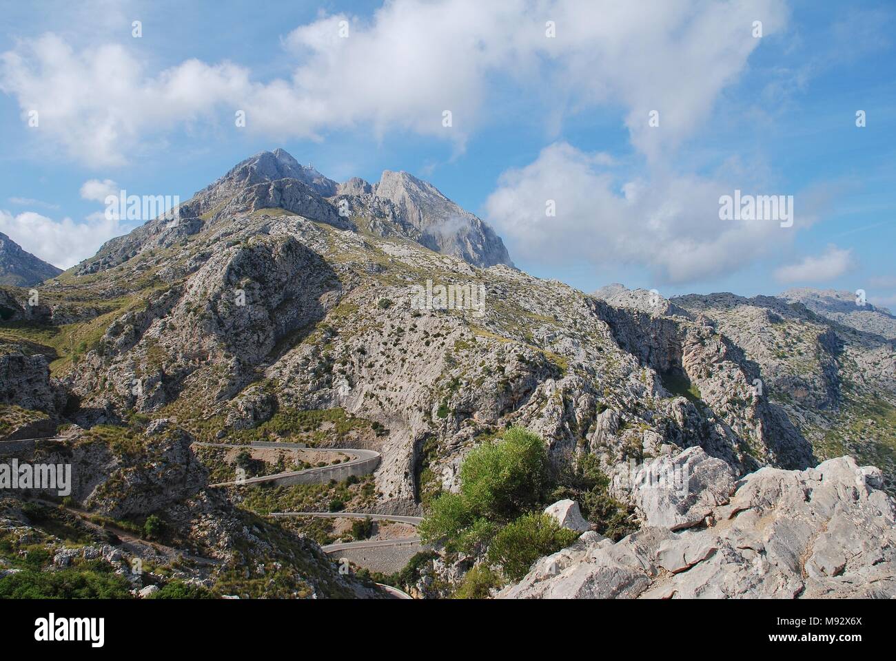 The twisting road down to Sa Calobra in the Serra de Tramuntana mountains on the Spanish island of Majorca on September 6, 2017. Stock Photo