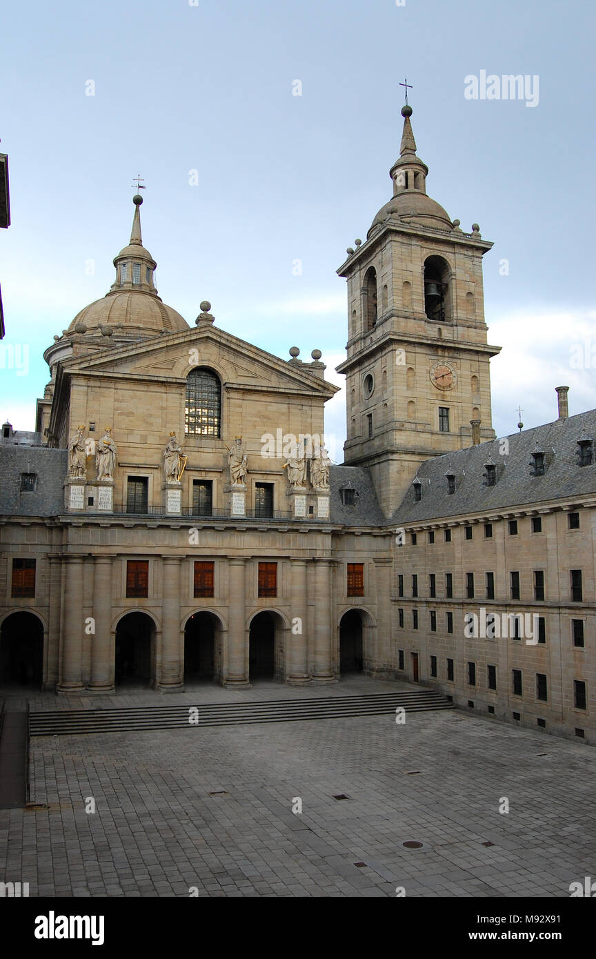 View of the courtyard entrance to the basilica of El Escorial. Spain Stock Photo