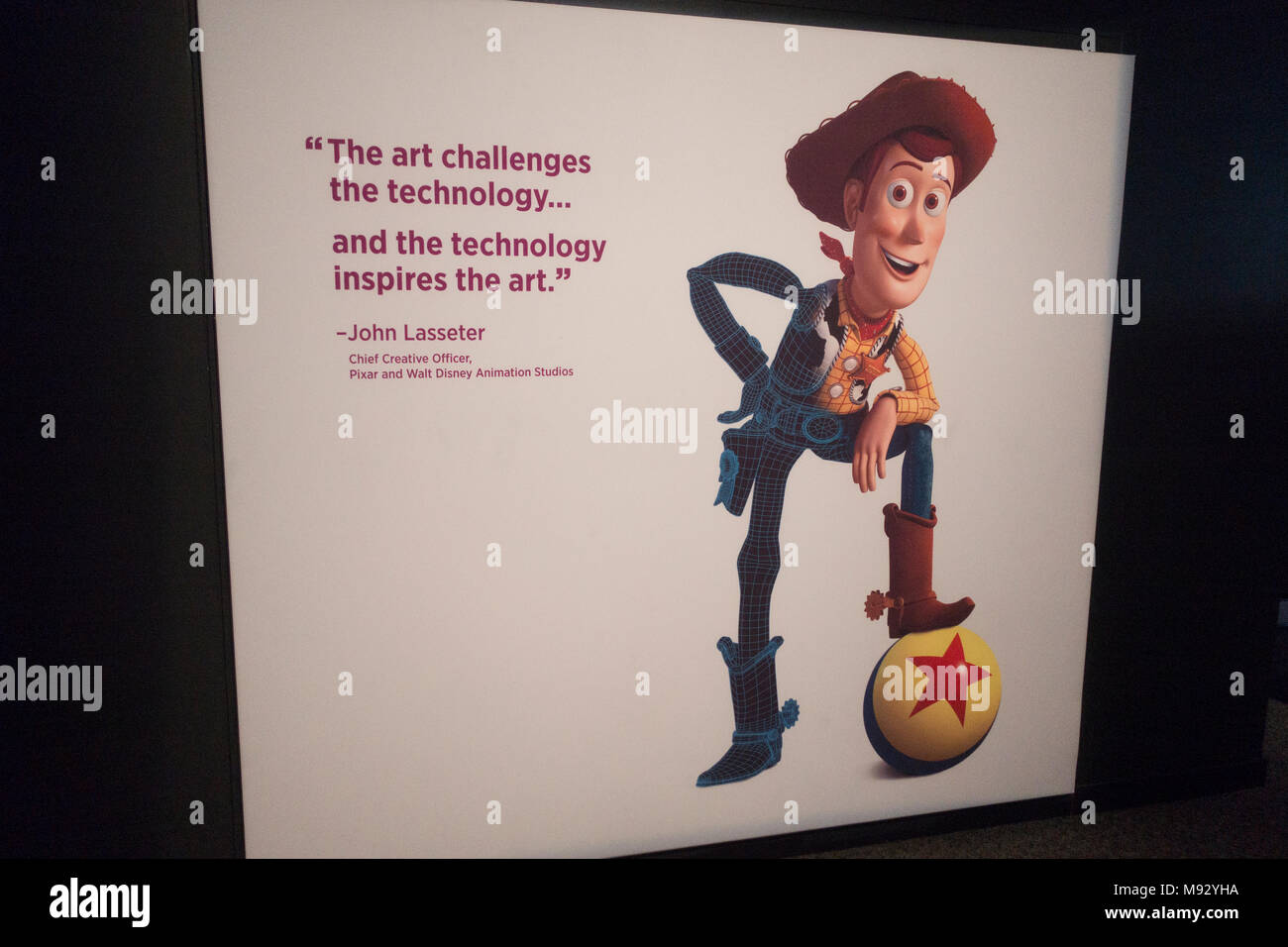 Sheriff Woody on a life-size poster with a commentary about art and technology by Pixar and Disney's John Lasseter. St Paul Minnesota MN USA Stock Photo