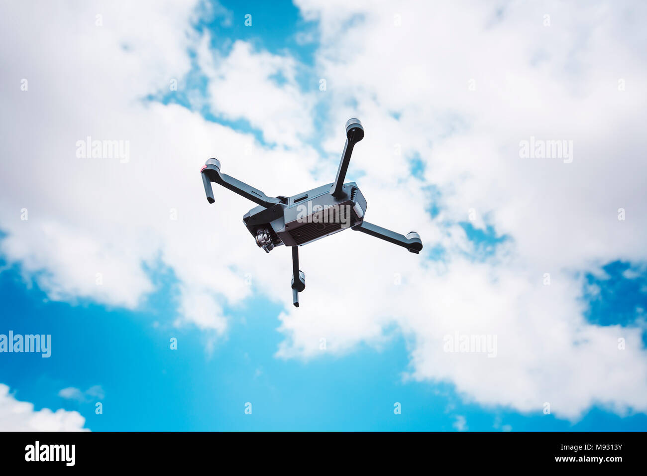 Uav drone copter flying with high resolution digital camera. Stock Photo