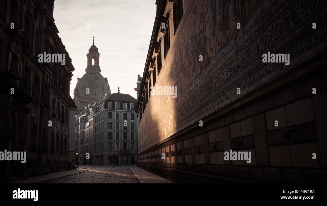 Our Lady's church / Church of Our Lady (Frauenkirche) in the early morning light, as seen from the Procession of Princes (Fürstenzug) -Dresden,Germany Stock Photo