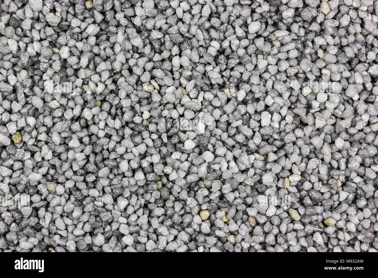 Grey fine gravel as background, place for text Stock Photo