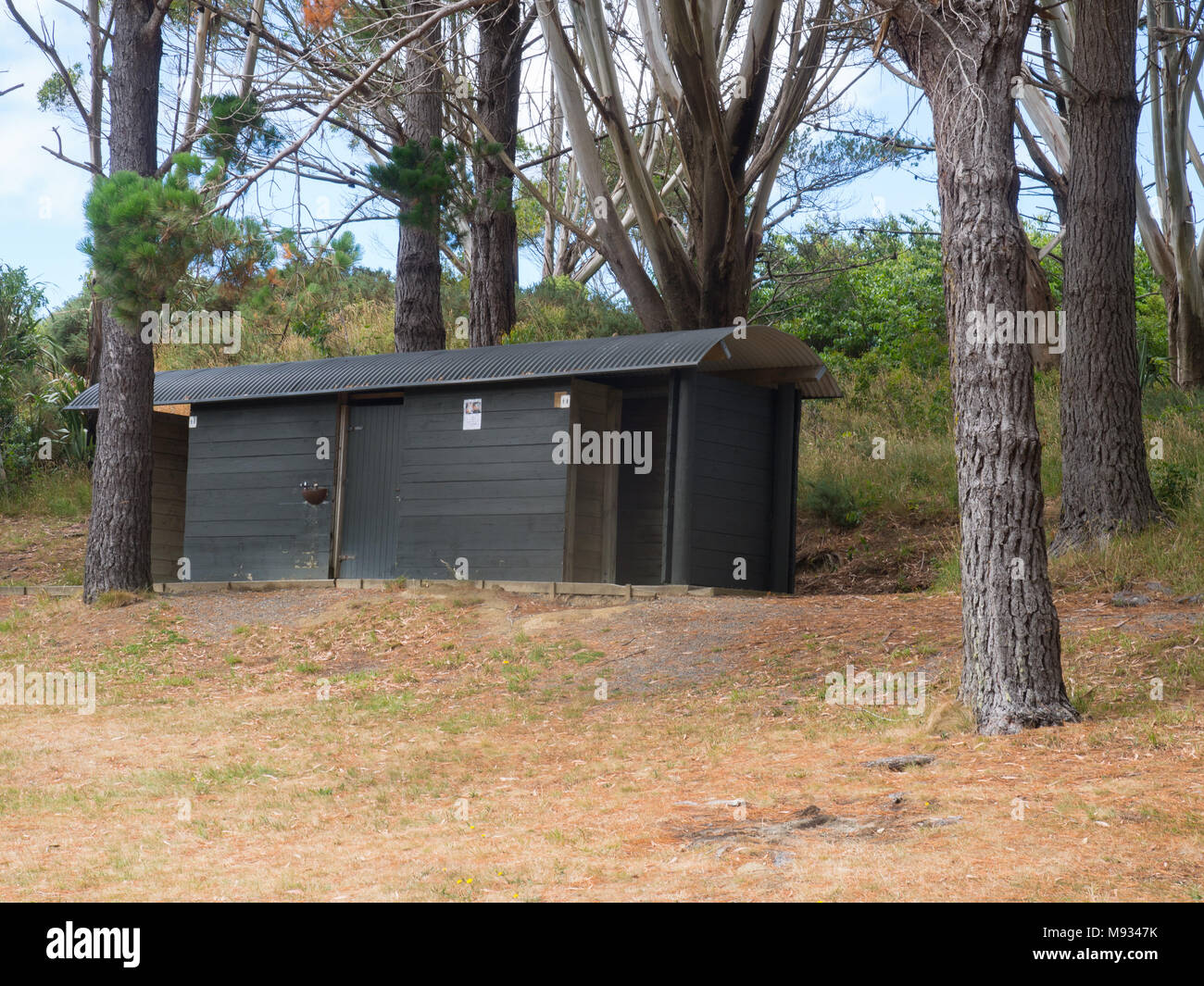 Public Toilets Building Amongst Some Trees Stock Photo