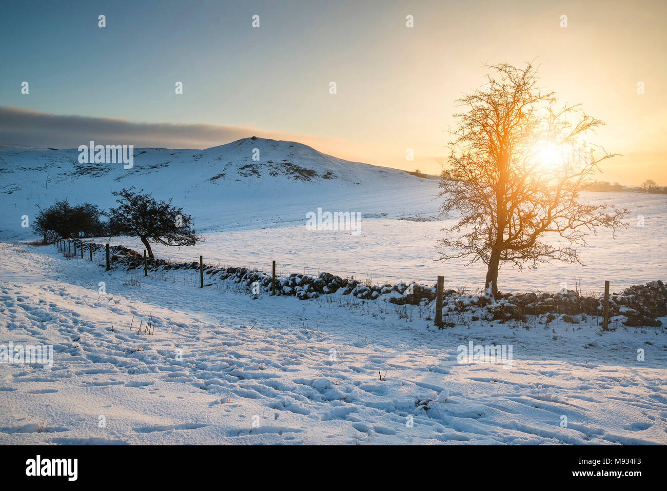Sunrise over snow covered hi-res stock photography and images - Alamy