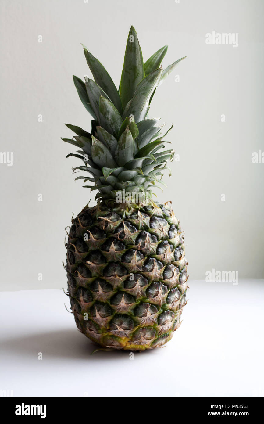 Ripe pineapple fruit isolated on white background Stock Photo