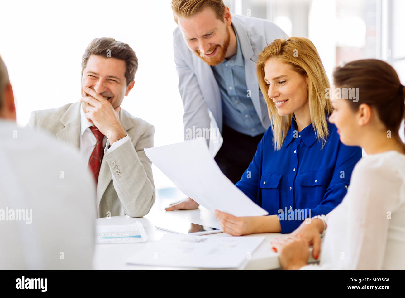 Coworkers working on project together Stock Photo