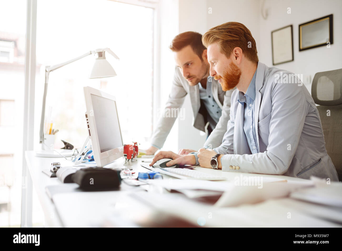 Coworkers planning startup goals Stock Photo