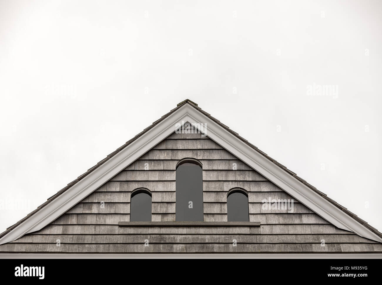 image of a roof and attic windows shaped with arches Stock Photo