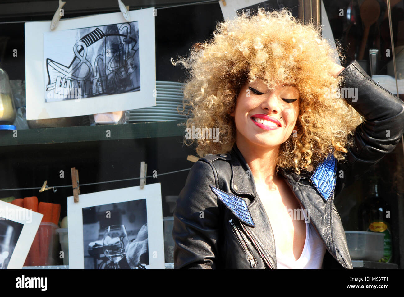 beautiful young happy attractive curly girl Stock Photo - Alamy
