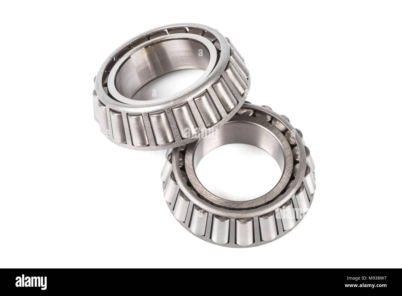 Two precision metal bearings on a white background Stock Photo Alamy