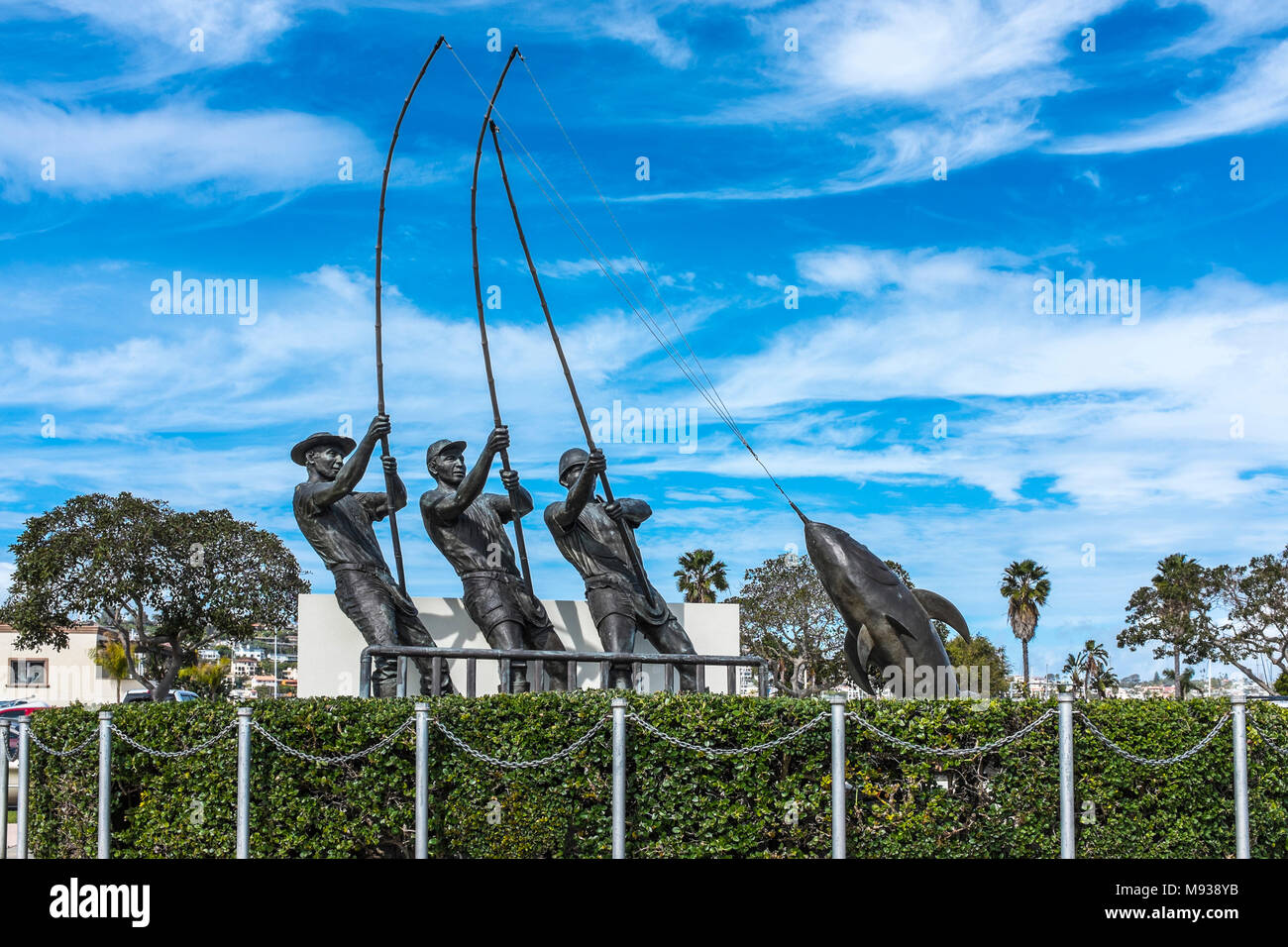 SAN DIEGO, CALIFORNIA, USA - Tunaman's Memorial  bronze sculpture of three tuna fishermen on Shelter Island in San Diego Bay. Stock Photo