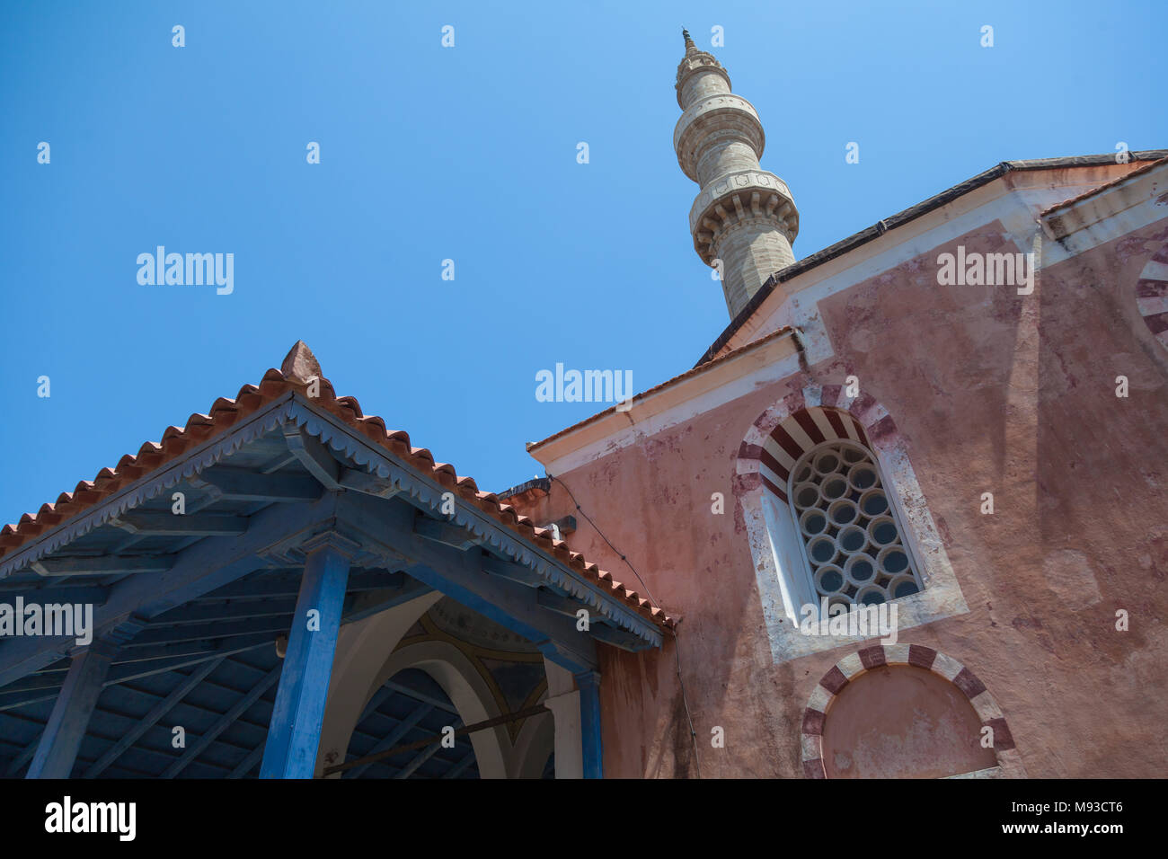 Minaret of the mosque in the old town of Rhodes Stock Photo